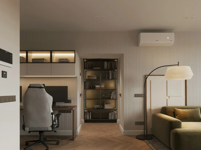 A living room with a couch a chair and a desk